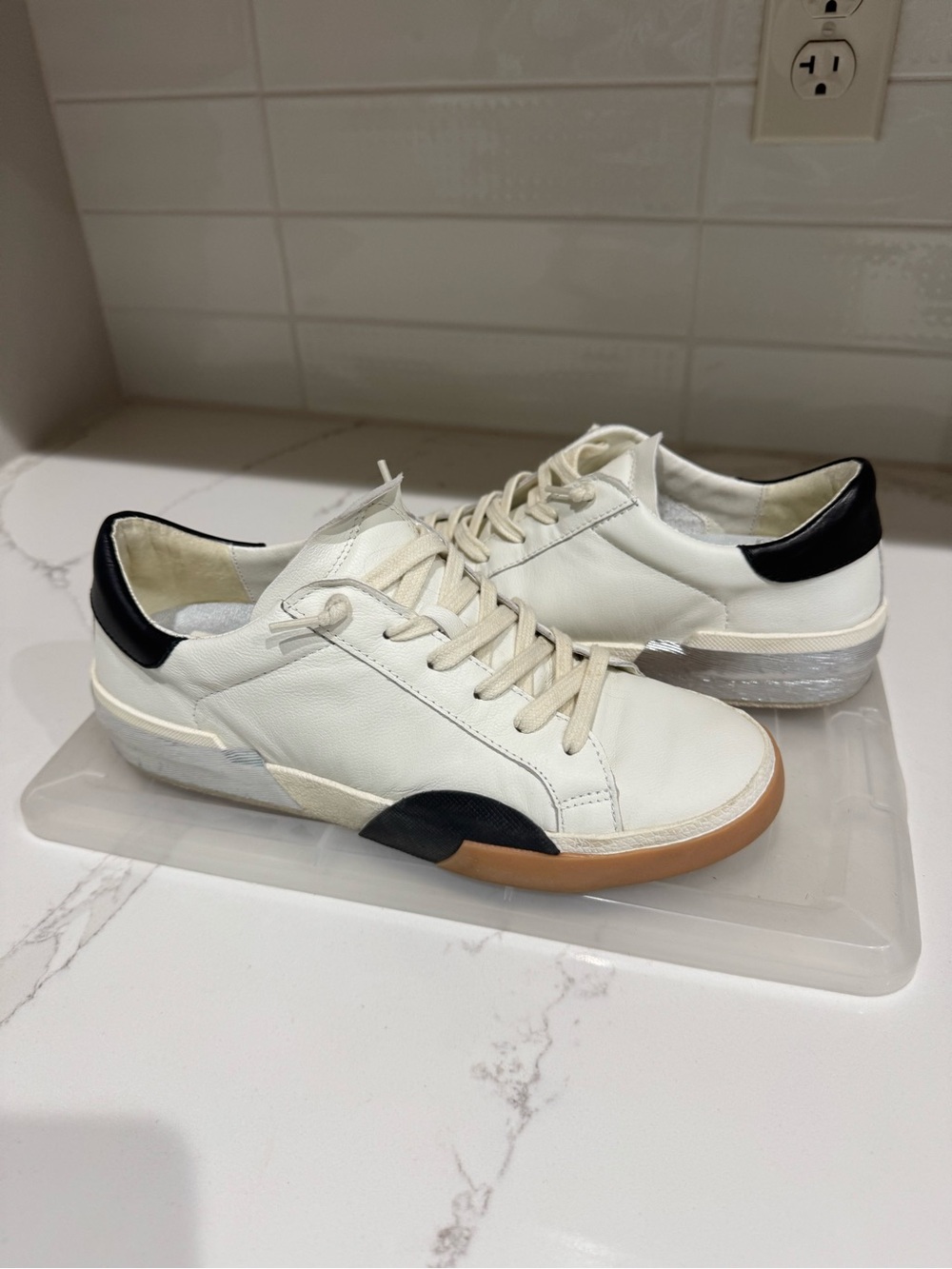 DV by Dolce Vita Cream Leather Sneakers with Black Accents and Gum Sole